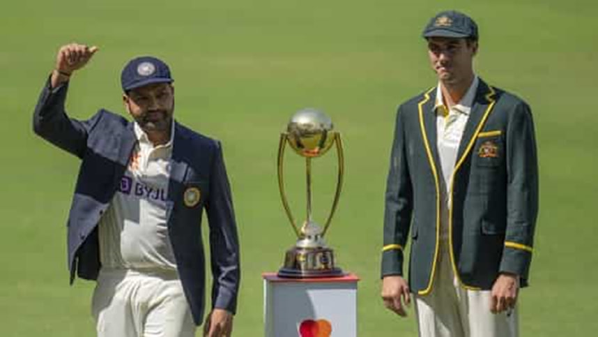 Both the captains of Australia and India, Pat Cummins and Rohit Sharma, are pictured holding the Border-Gavaskar Cup